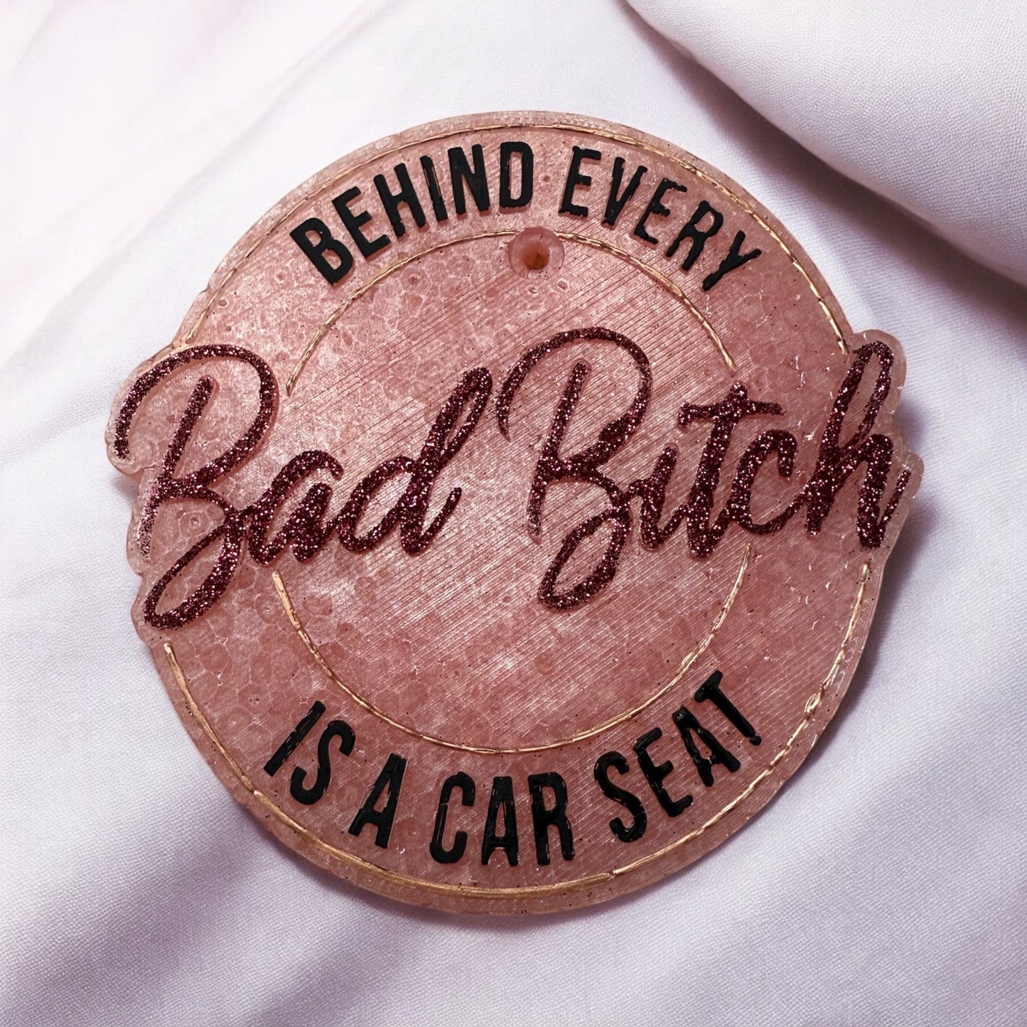 Behind every bad B is a car seat