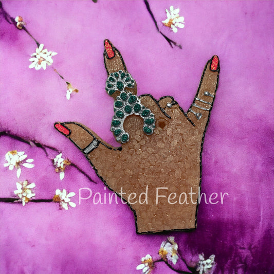 Hand with squash blossom ring